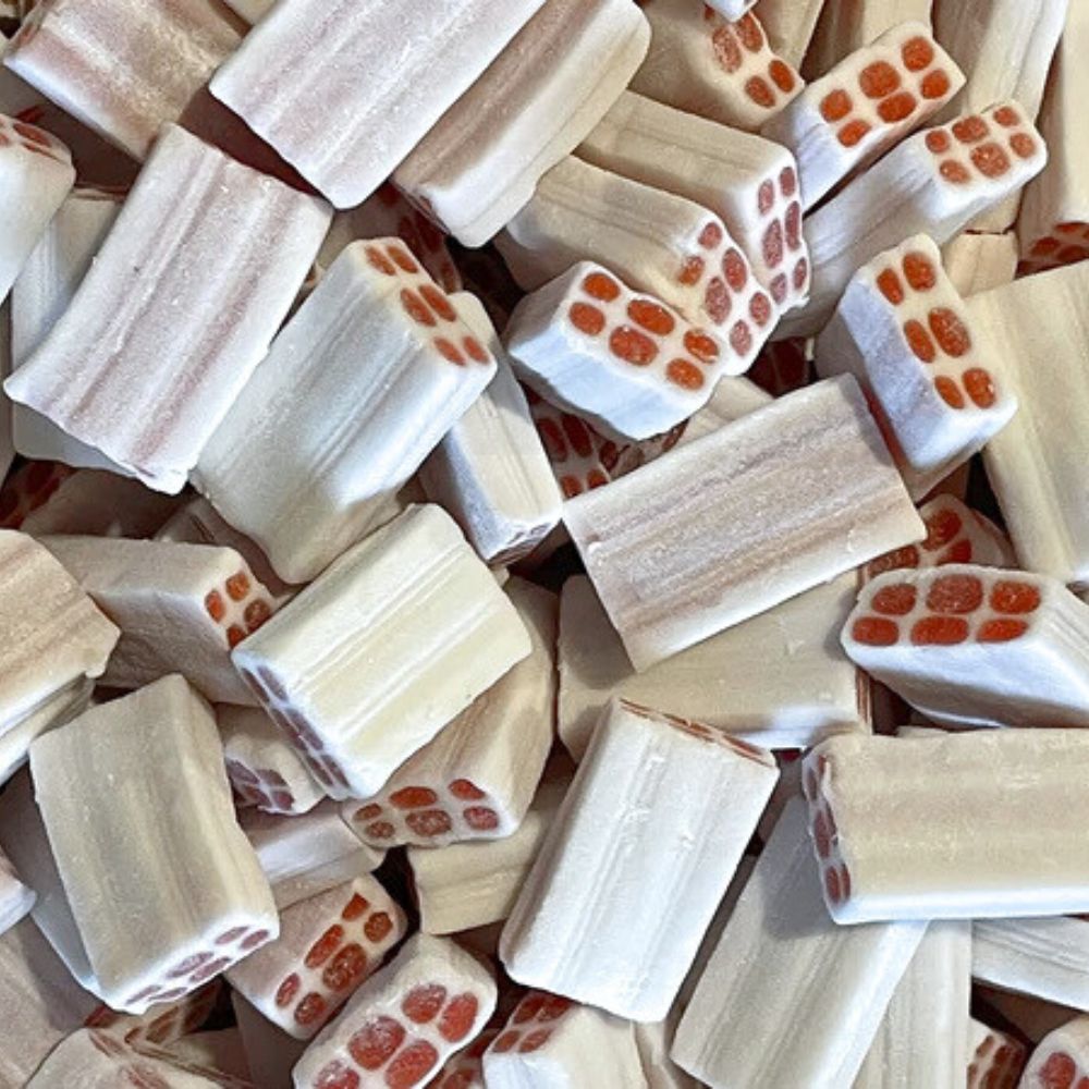 Ladrillos blancos de fresa y nata de Vidal, rojos por dentro y blancos por fuera, bolsa de 1,6 kg