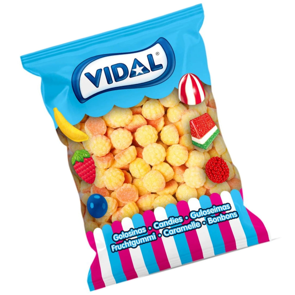 Gominolas Besos de Natillas Vidal de color amarillo con cobertura de azúcar y sabor a nata y caramelo