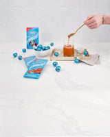 BOMBONES LINDOR SALTED CARAMEL CORNET 200 GR - Mono Banano