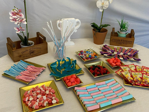 Mesa dulce de chuches montada para un evento
