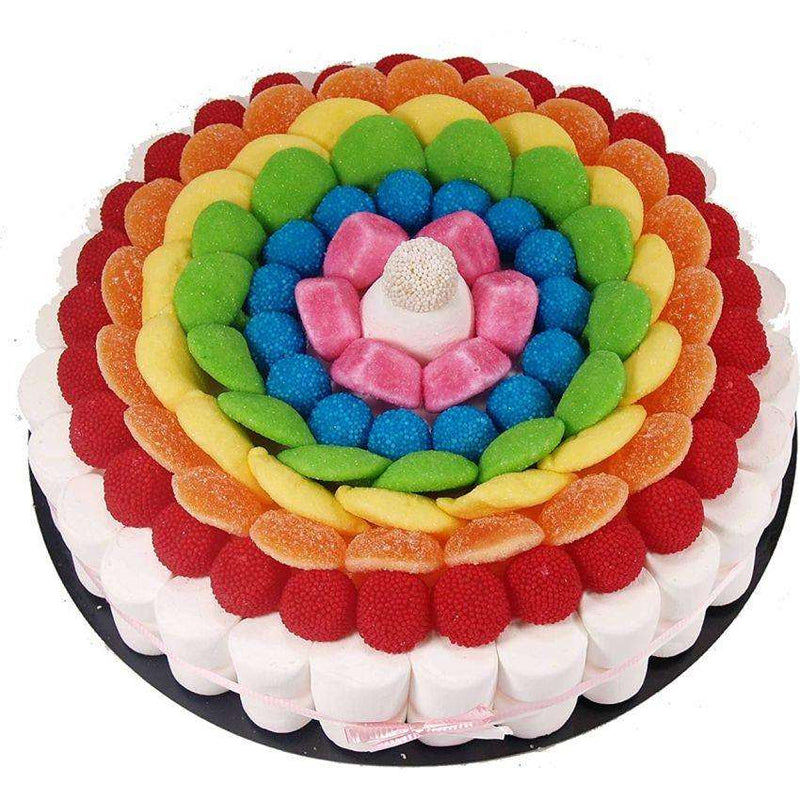 Tarta de chuches arcoíris con golosinas de colores en caja de regalo